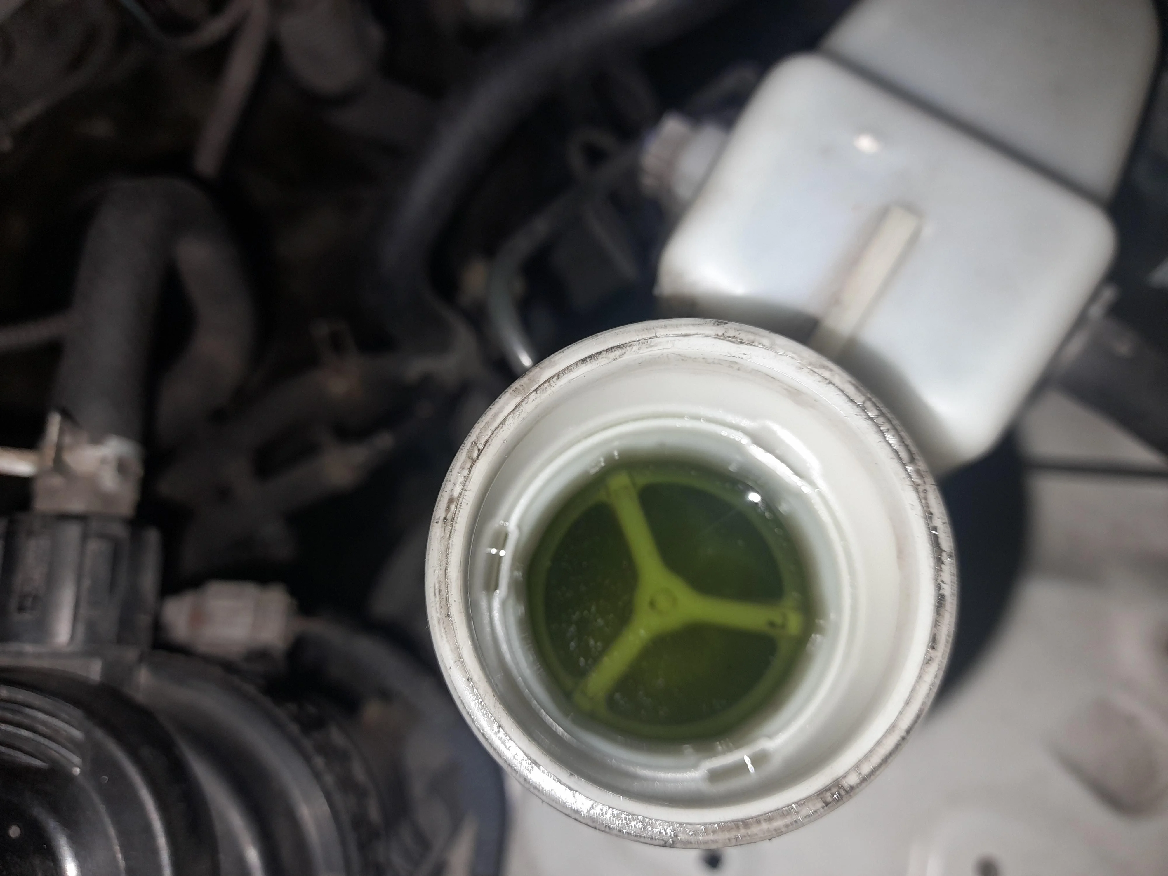 Why Is My Brake Fluid Green? Causes, Concerns, and Solutions