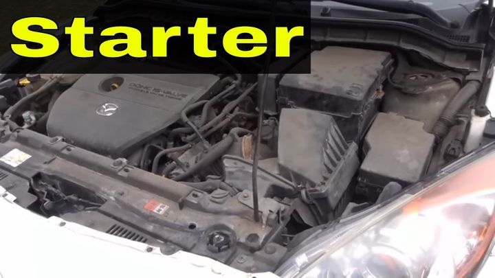 WHERE IS THE STARTER LOCATED IN A CAR?